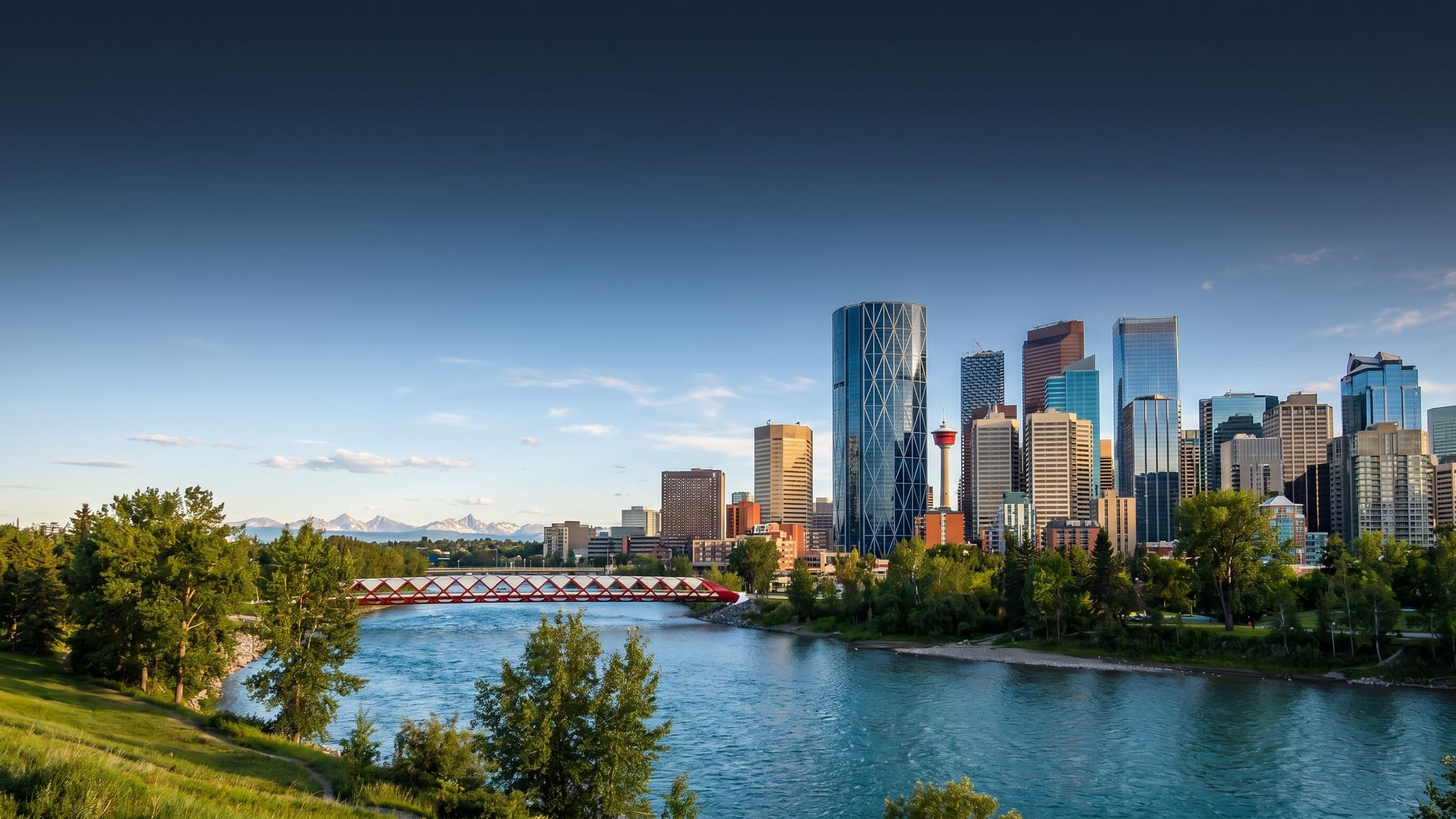 Plumber Calgary - Right Choice Plumbing licensed plumbing Calgary service with the downtown skyline, Calgary Tower, the Bow building and the Peace Bridge over the Bow River in the background